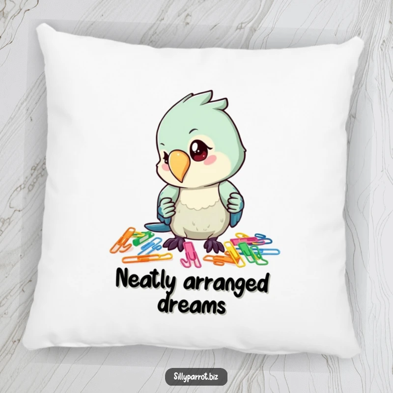 Funny pillow displaying a parrot with intense concentration, neatly organizing a pile of vibrant, colorful paper clips.