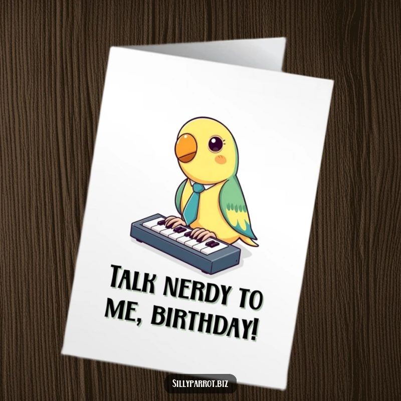 Funny Free Printable Birthday Card: A parrot wearing a tiny tie enthusiastically types on a miniature keyboard, sending birthday greetings.